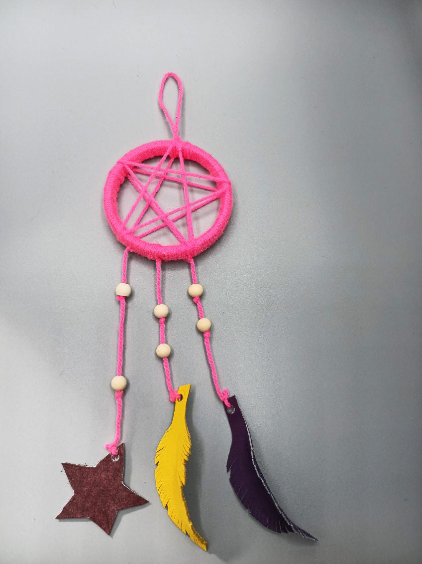 Attrape rêve en laine rose