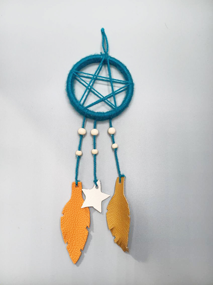 Attrape rêve en laine turquoise