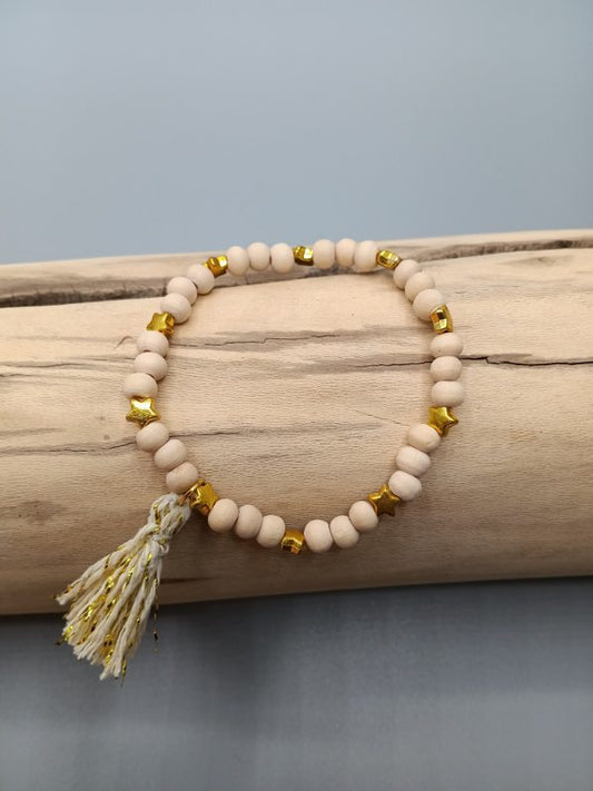 Bracelet fantaisie perles en bois naturels et étoiles dorées